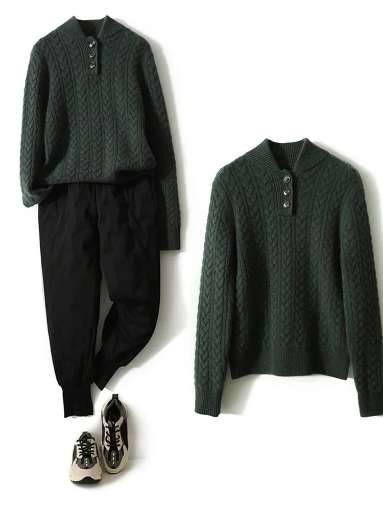 Dark green cable knit sweater displayed flat beside a second matching sweater and casual outfit accessories.
