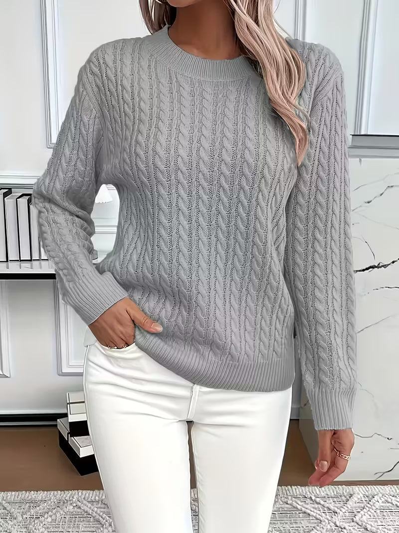 Gray cable knit crew neck sweater featuring an all-over vertical cable pattern and ribbed sleeve cuffs.