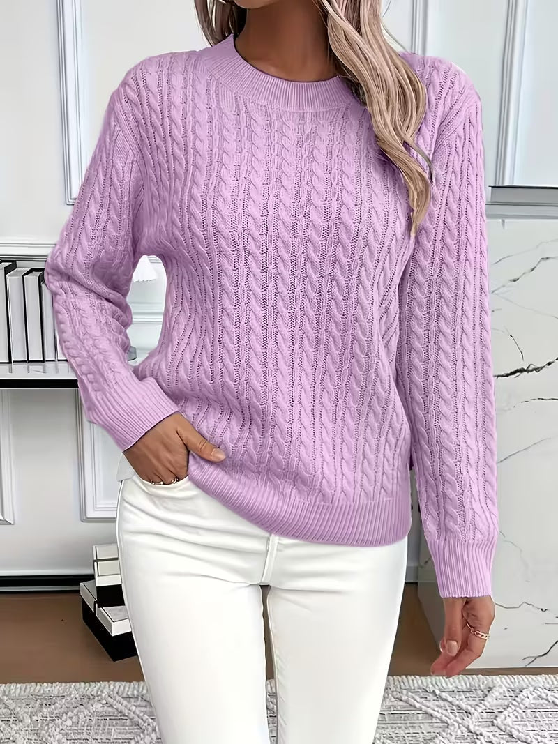 Lavender cable knit crew neck sweater with a regular-length hem and long sleeves, paired with white jeans.
