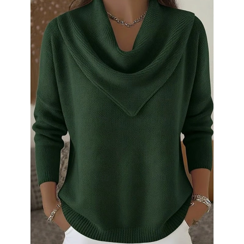 Front view of the cowl neck sweater in dark green, showing the pointed drape and curved ribbed hem.