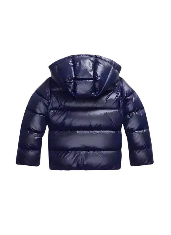Back view of the dark navy cropped puffer jacket, highlighting the attached hood, horizontal quilted sections, long sleeves, and short hem.