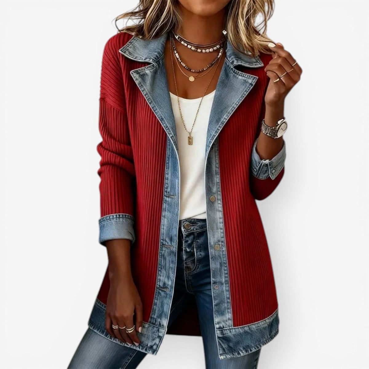 Red ribbed longline jacket styled with a notched denim-look collar, contrasting blue trim, rolled cuffs, and button closures.