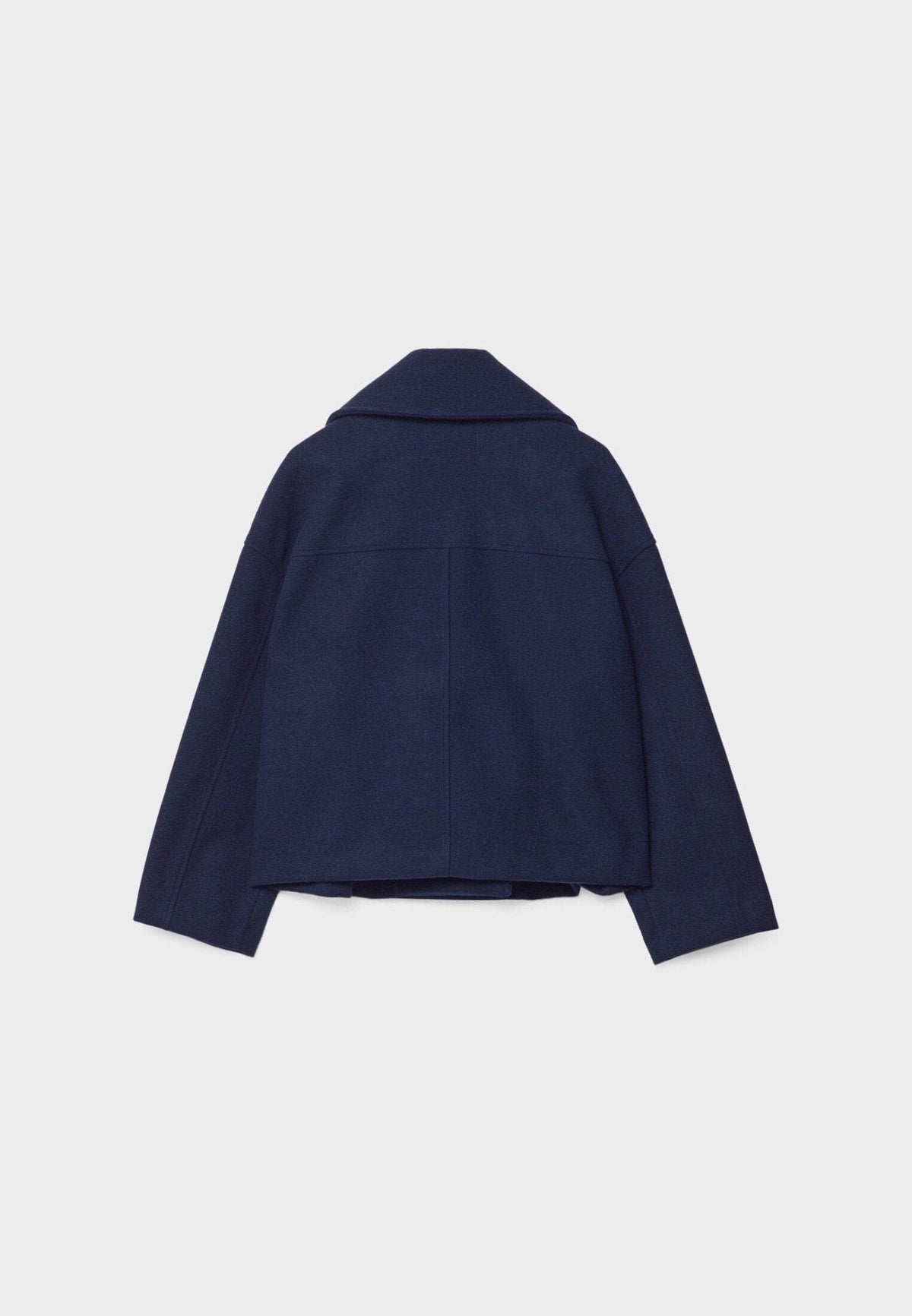 Navy cropped jacket shown from the back with a straight cropped hem and structured back panel.