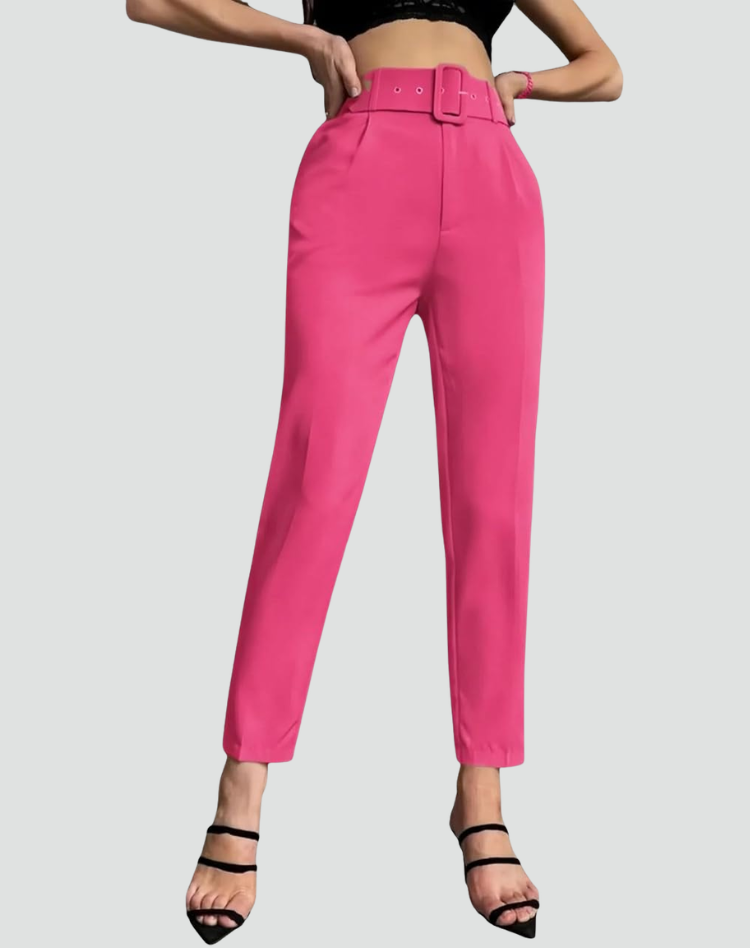 Bright pink high-waisted pleated trousers with a matching belt, tapered ankle-length legs, and side pockets, paired with a black top and strappy sandals.