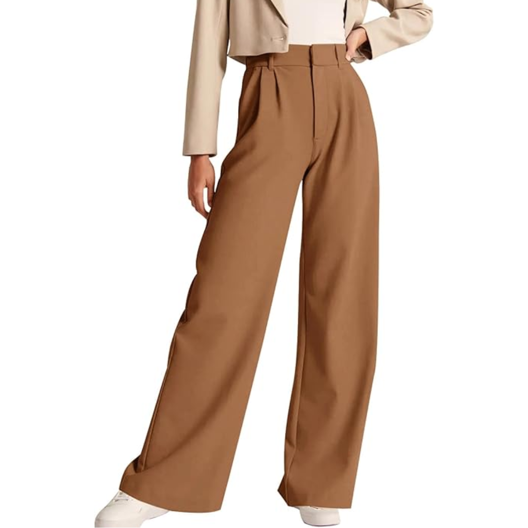Warm tan wide-leg trousers with a high waist and visible front pleats, paired with white sneakers.