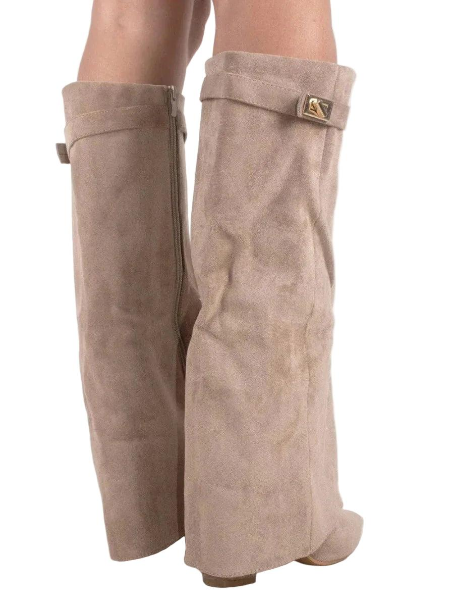 Taupe knee-high boots shown from the back and side, featuring tall shafts, folded trim, pointed toes, and small heels.