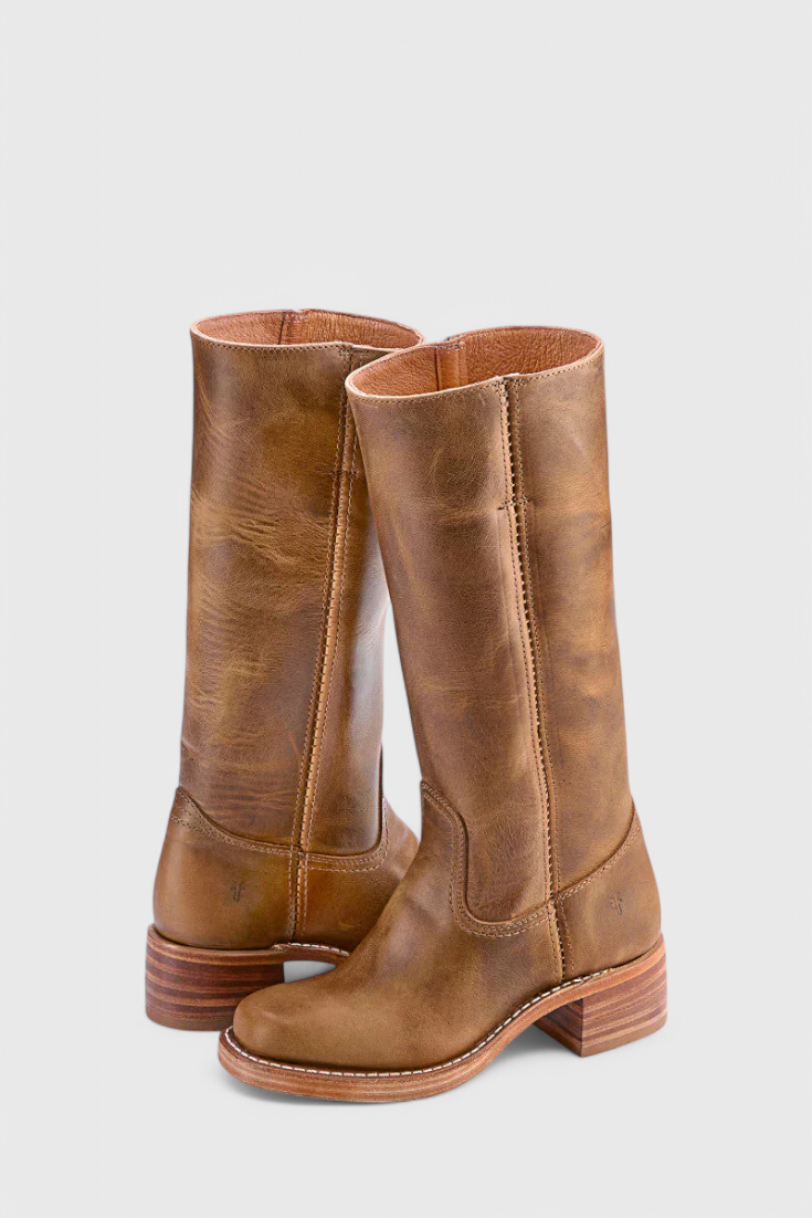 Pair of medium-brown knee-high boots in a crossed three-quarter arrangement, showing rounded toes and stacked heels.