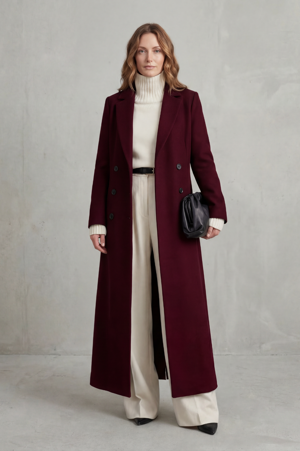 Deep burgundy tailored coat shown head-on, highlighting the classic button front and extended long hem.