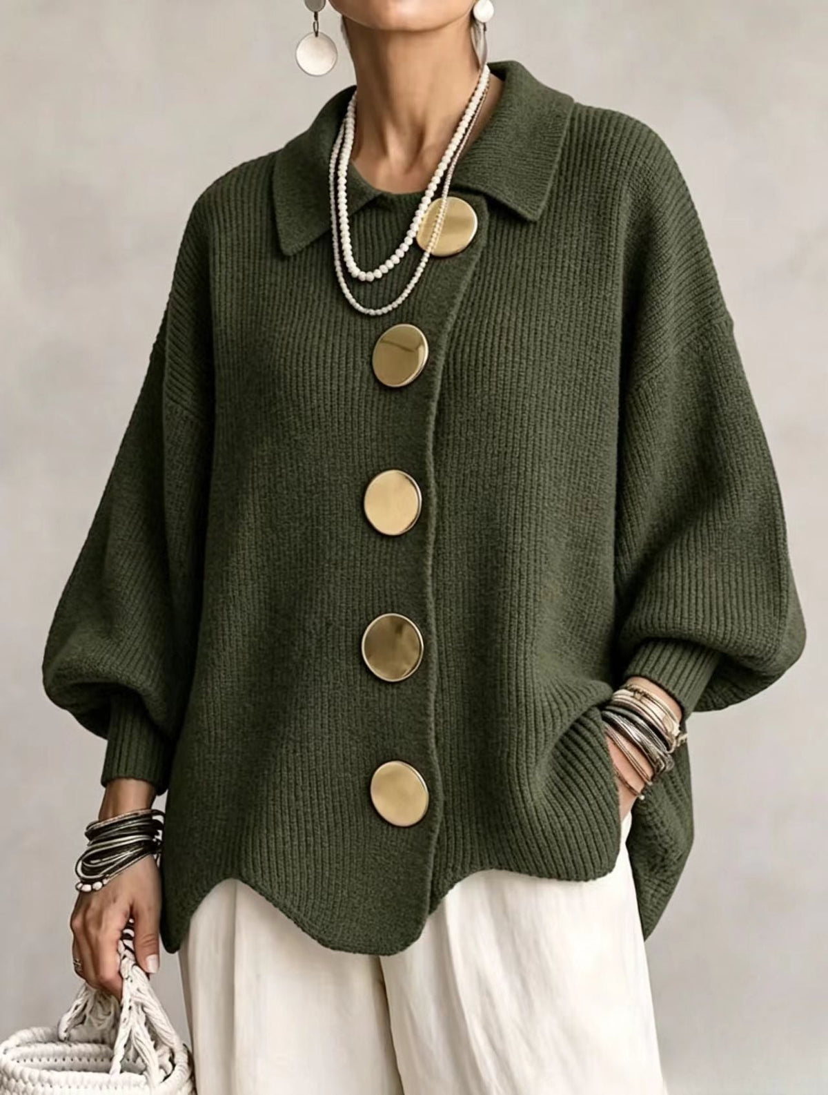 Olive green oversized button-front cardigan with a pointed collar, rounded buttons, and softly gathered balloon sleeves.