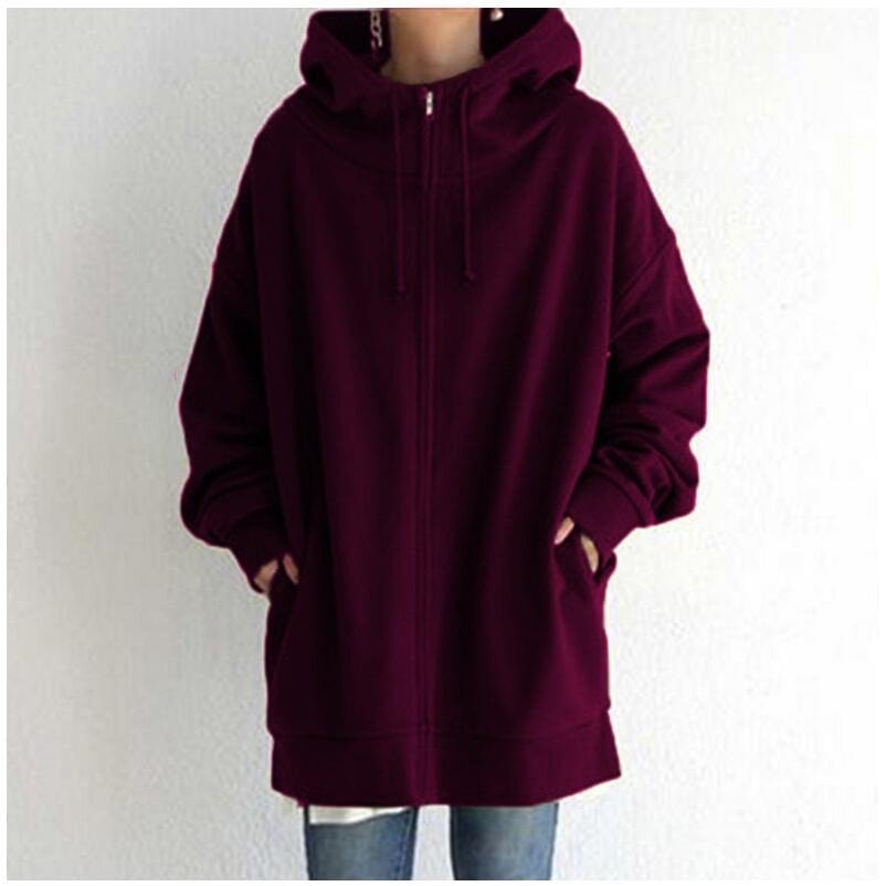 Front view of the longline zip-up hoodie in dark burgundy, showing its high neckline, full front zip, and side pockets.