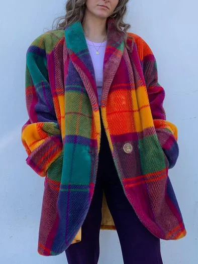 Oversized longline coat in a bold multicolour plaid pattern, featuring long sleeves, a notched lapel collar, front patch pockets, and a button closure.