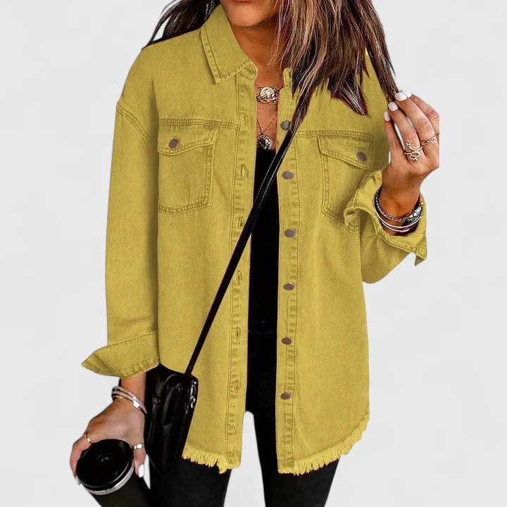 Mustard-yellow button-front jacket with a relaxed cut, two chest pockets, and a casually frayed hem.
