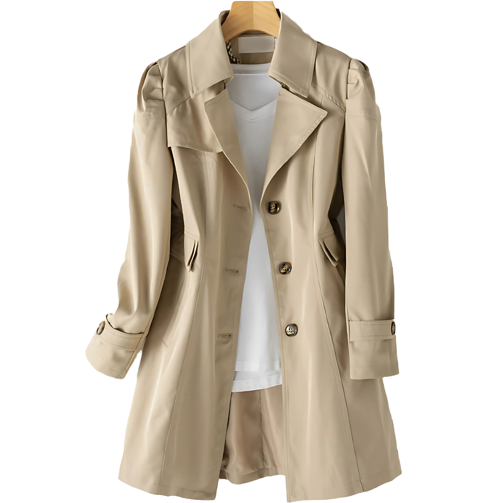 Light beige trench coat displayed on a hanger with the front partially open, highlighting the notched lapel, three-button fastening, angled side pockets, and long sleeves.
