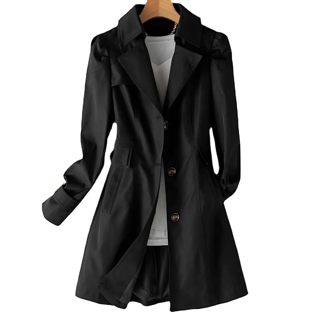 Black version of the single-breasted mid-length trench coat displayed on a hanger, featuring notched lapels, a buttoned front, side pockets, and cuff straps.