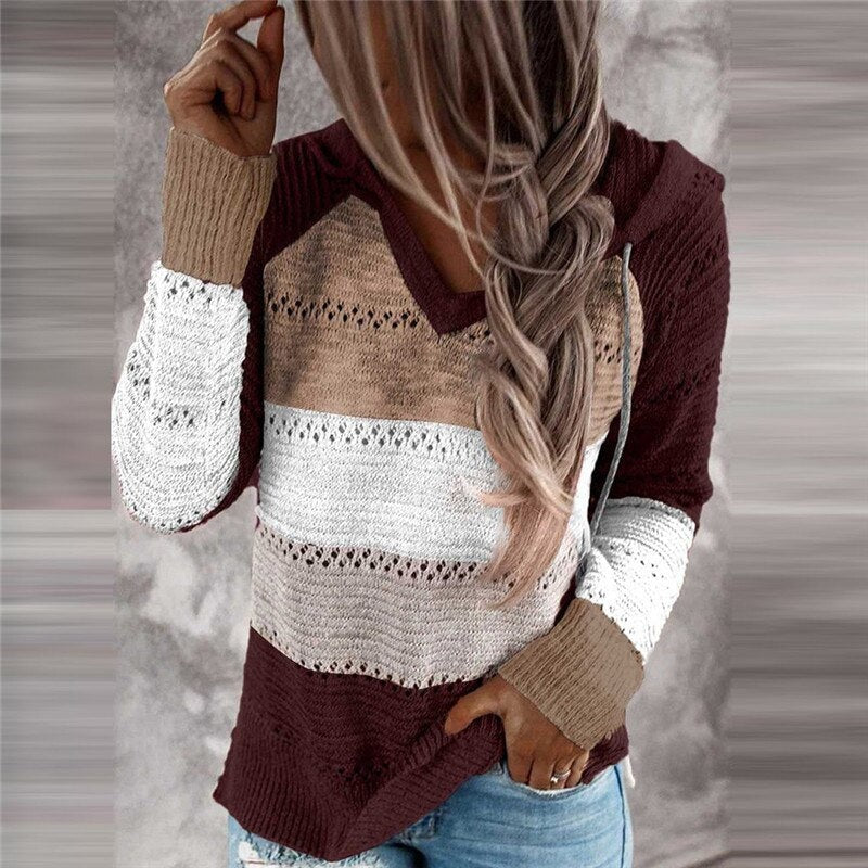 Striped openwork hooded sweater in burgundy, beige, white, and gray, featuring a relaxed pullover shape and contrasting cuffs.