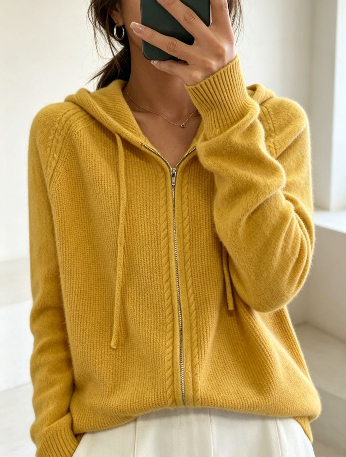 Mustard yellow hooded cardigan with an open neckline, long drawstrings and ribbed sleeve cuffs.