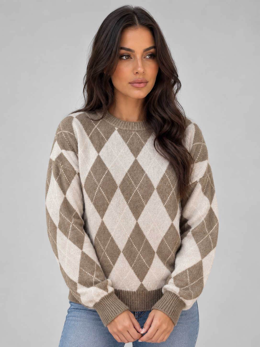 Front view of the brown and cream argyle jumper with its crew neckline, softly defined ribbed trim and long sleeves.