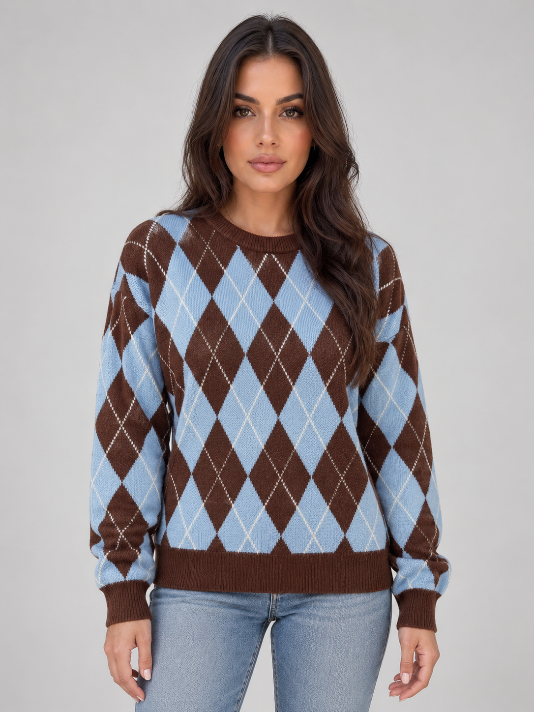 Front view of the argyle crew neck jumper in a brown and light blue diamond pattern with long sleeves and ribbed edging.