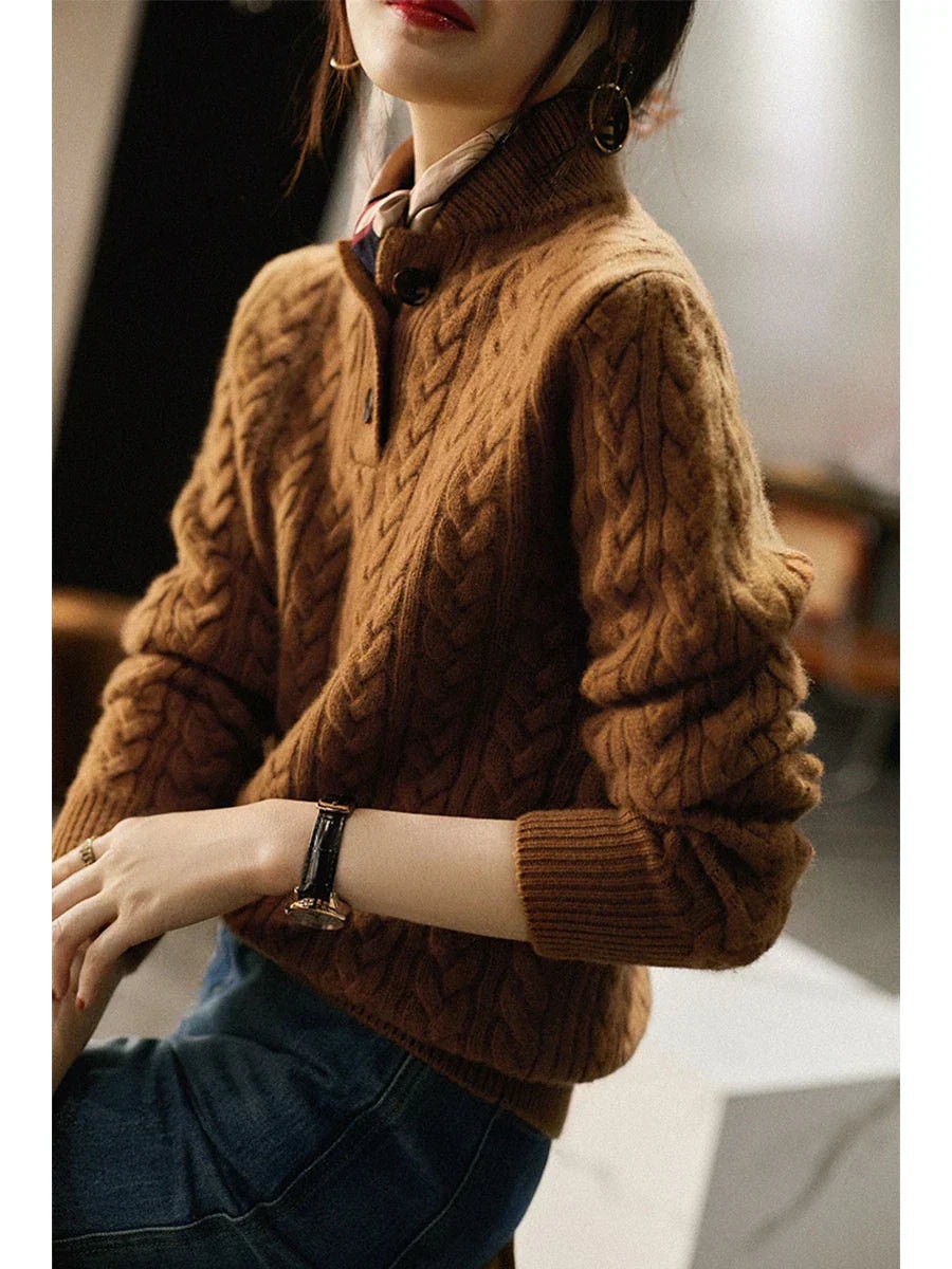 Side view of the brown button collar sweater showing its close-fitting shape, long sleeve, and ribbed cuff.
