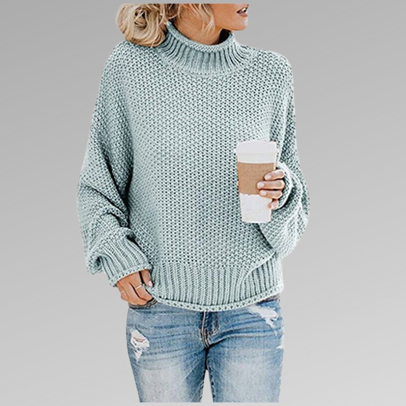 Pale blue chunky knit turtleneck sweater with textured knit detail, long sleeves and a softly relaxed shape.