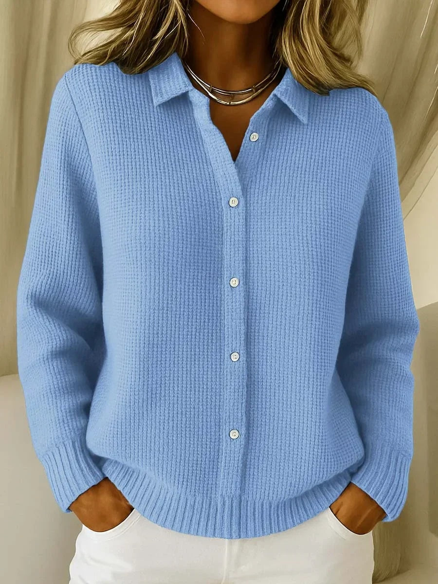 Light blue women's cardigan with a shirt collar, button-front closure, long sleeves, ribbed cuffs, and a hip-length hem.
