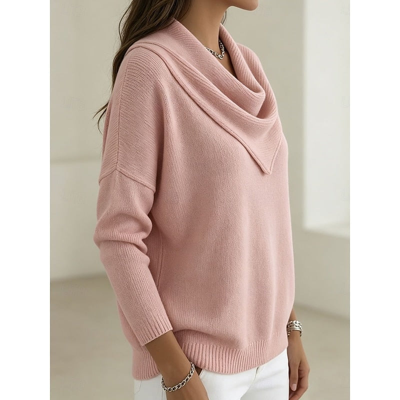 Side view of the pink cowl neck sweater highlighting its easy fit, long sleeve, and softly curved hem.