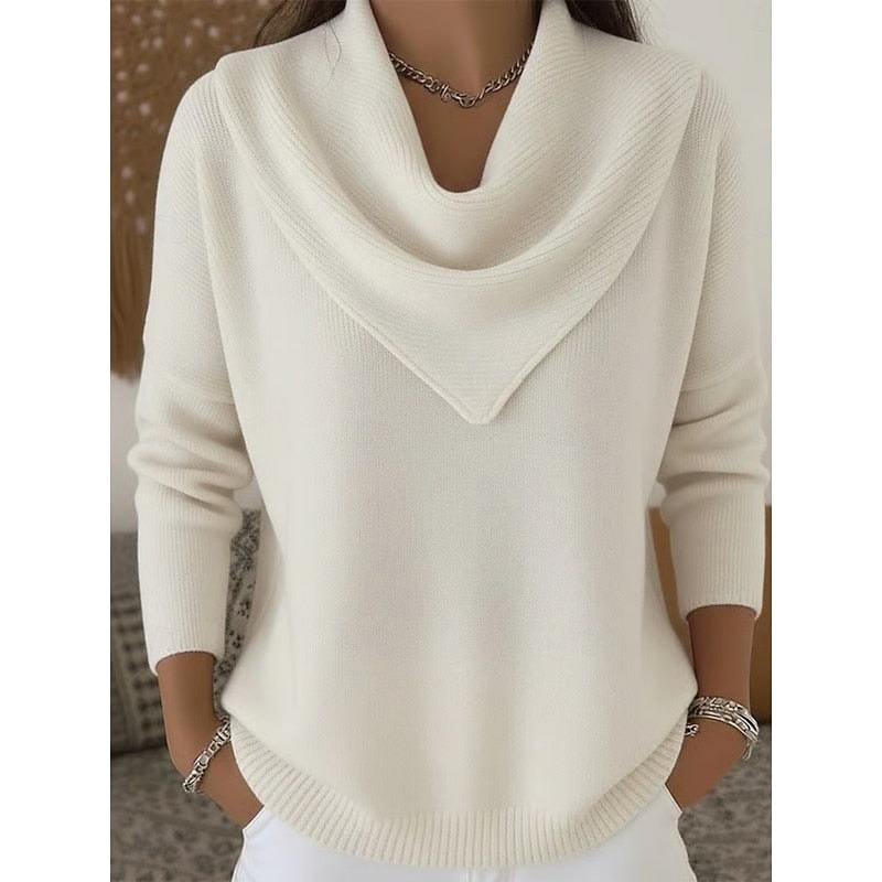 Front view of the cowl neck sweater in ivory, showing its relaxed shape and defined ribbed hem.