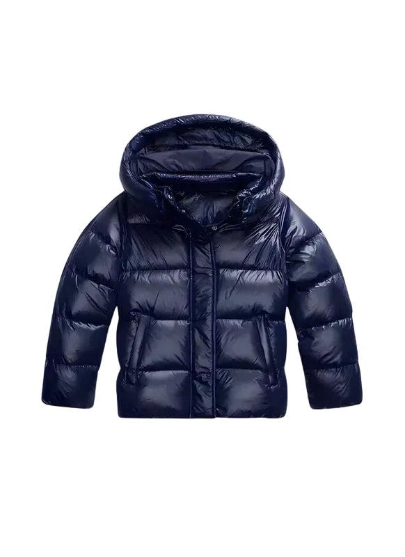 Front view of the cropped puffer jacket in dark navy, showing its fixed hood, raised collar, glossy horizontal quilting, center zipper, long sleeves, and side pockets.