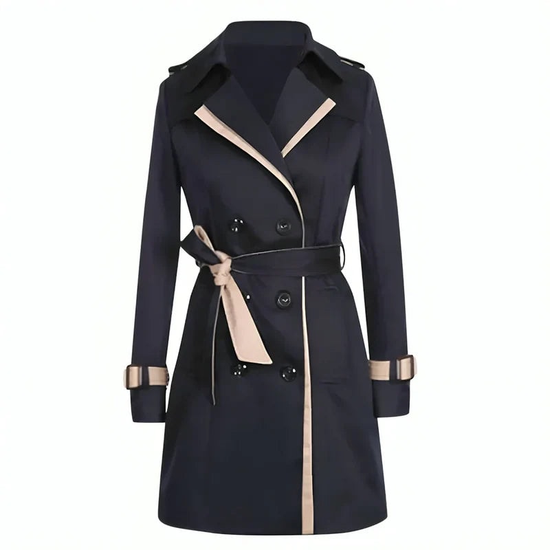 Front view of a dark knee-length double-breasted trench coat with contrasting light trim along the lapels, front edge, belt, and sleeve straps.