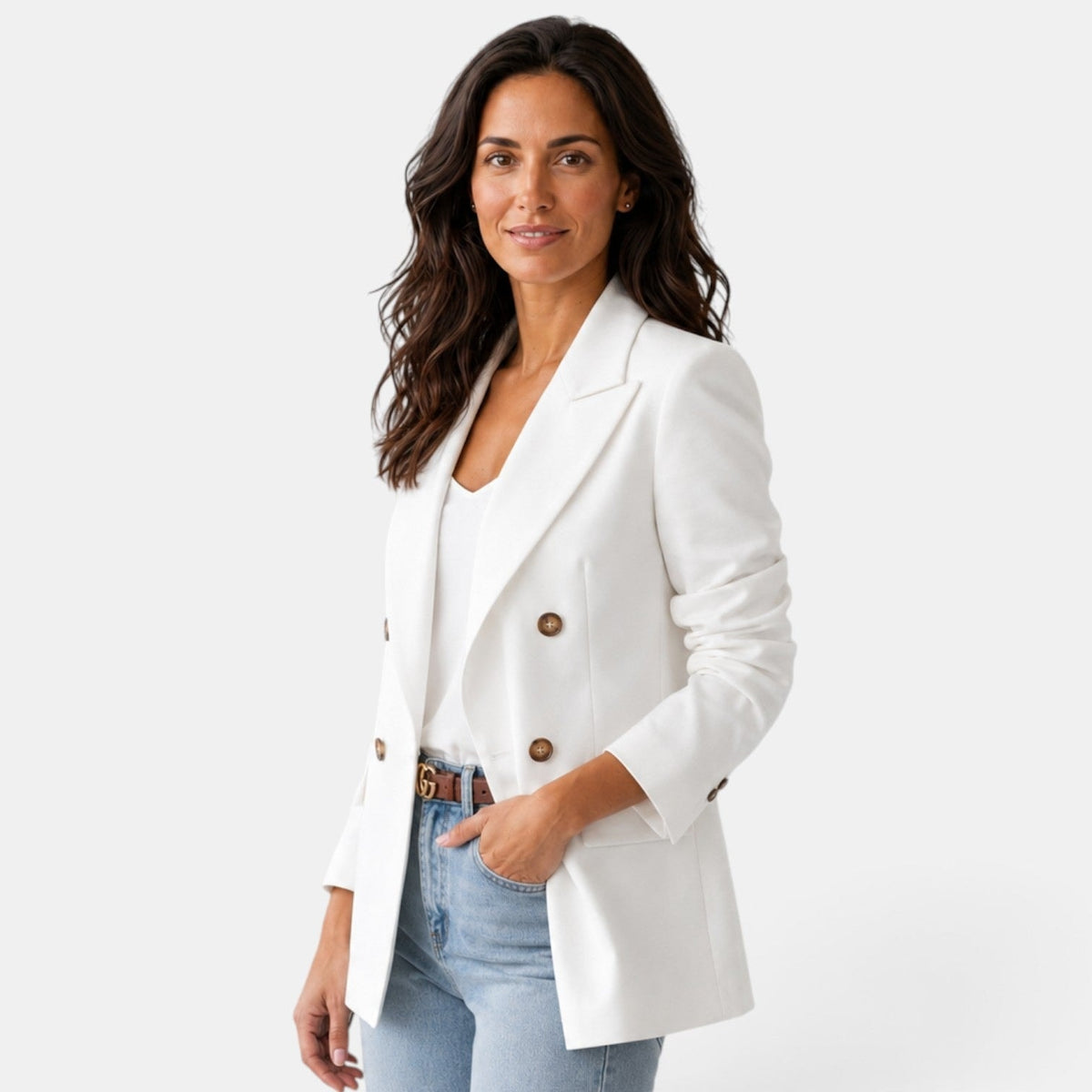 Three-quarter front view of the white blazer showing its tailored shape, overlapping button closure, notch lapel, and side flap pocket.