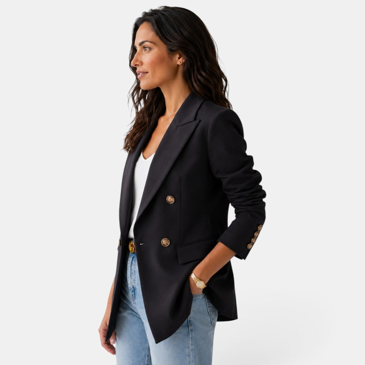 Side front view of the black blazer highlighting the notch lapel, overlapping front, flap pocket, and sleeve cuff buttons.