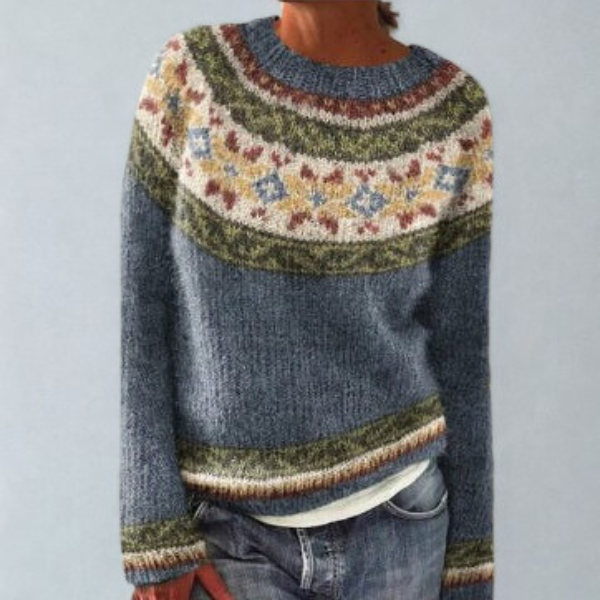 Blue-gray Fair Isle crew neck sweater with a broad cream, olive, and brown geometric yoke and coordinating hem bands.