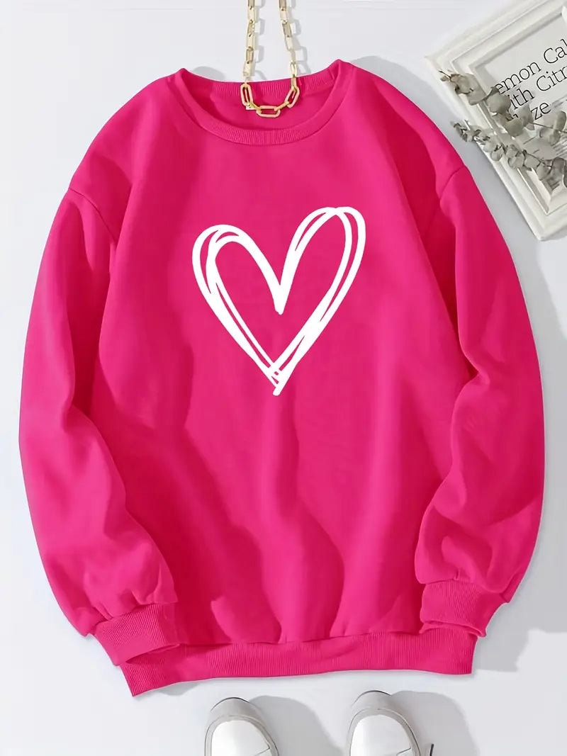 Bright pink heart print sweatshirt displayed flat, showing its crew neckline, long sleeves, and ribbed cuffs and hem.