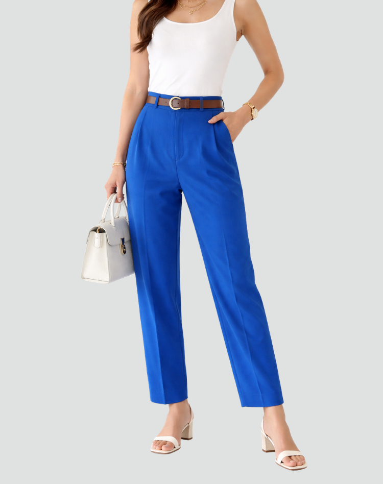 Vivid blue high-waisted trousers with front pleats, tapered ankle-length legs, and side pockets, styled with a white tank top and brown belt.