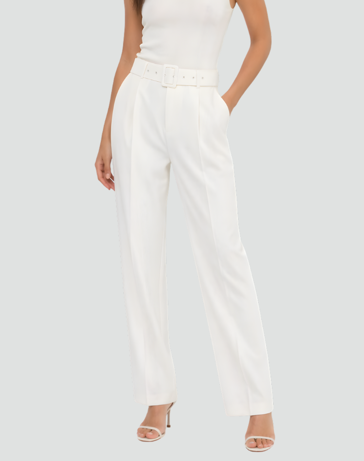 White high-waisted pleated trousers with tapered ankle-length legs and side pockets, styled with a matching white belt and heeled sandals.