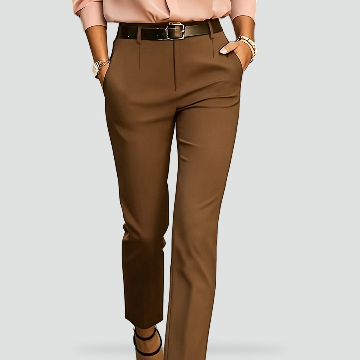 Medium brown ankle-length trousers displayed in a cropped front view with a streamlined leg.