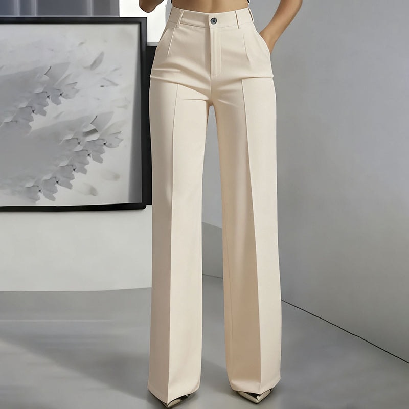 Front view of cream wide-leg pants with a high waistband, button closure, pleats, and side pockets.