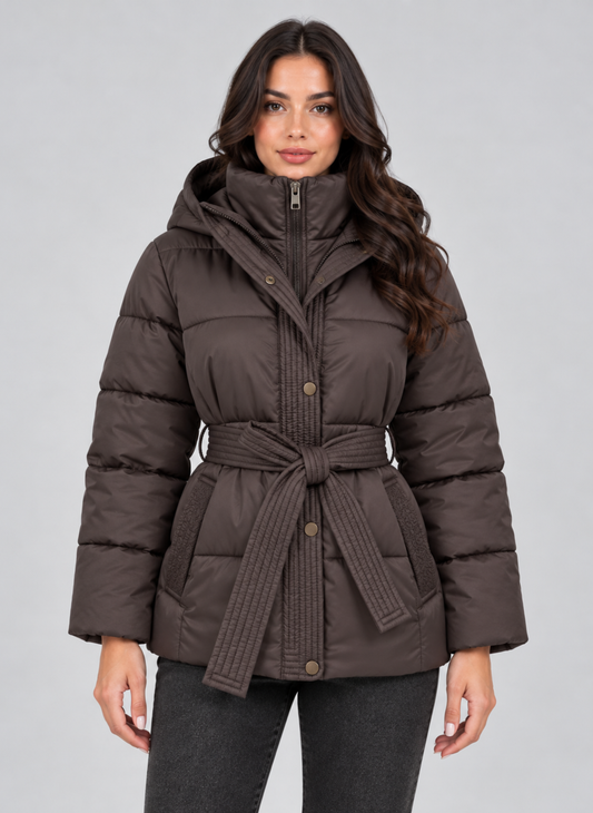 Front view of a brown quilted puffer jacket with a high collar, hood, front closure, long sleeves, side pockets, and a tied waist belt.