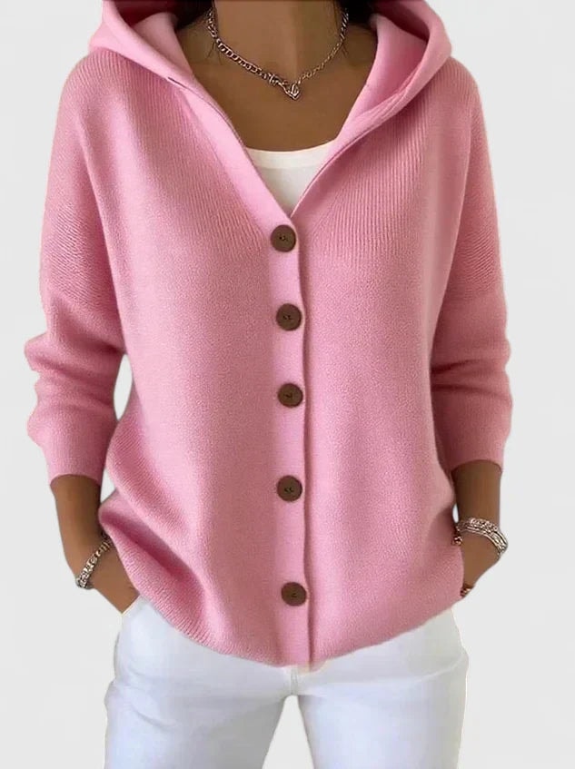Pink hooded cardigan featuring a button-front closure, long sleeves, and a softly curved hem.