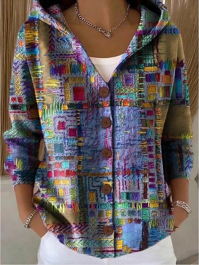 Hooded button-front cardigan with long sleeves and a vivid multicolour abstract patchwork print.