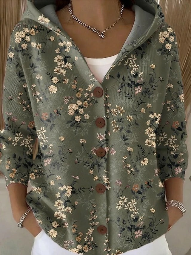 Muted green hooded button-front cardigan covered in a delicate floral and leafy print.