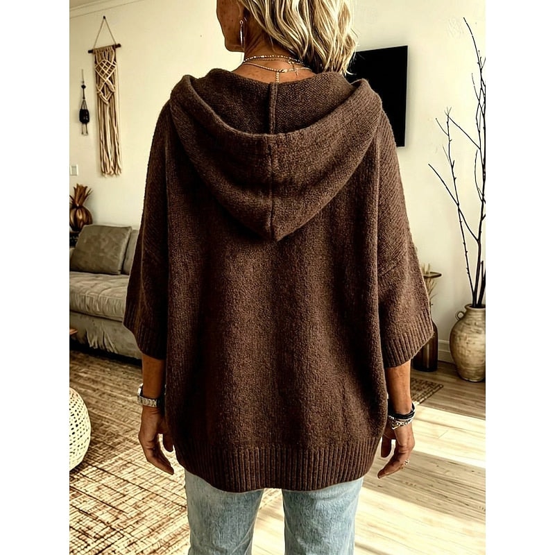 Back view of the brown hooded cardigan, highlighting the draped hood, three-quarter sleeves, and longer rounded back hem.