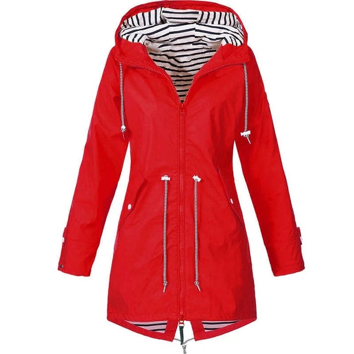 Red version of the hooded raincoat shown front-facing, featuring a striped hood lining, central zip, drawstring waist, and zippered pockets.