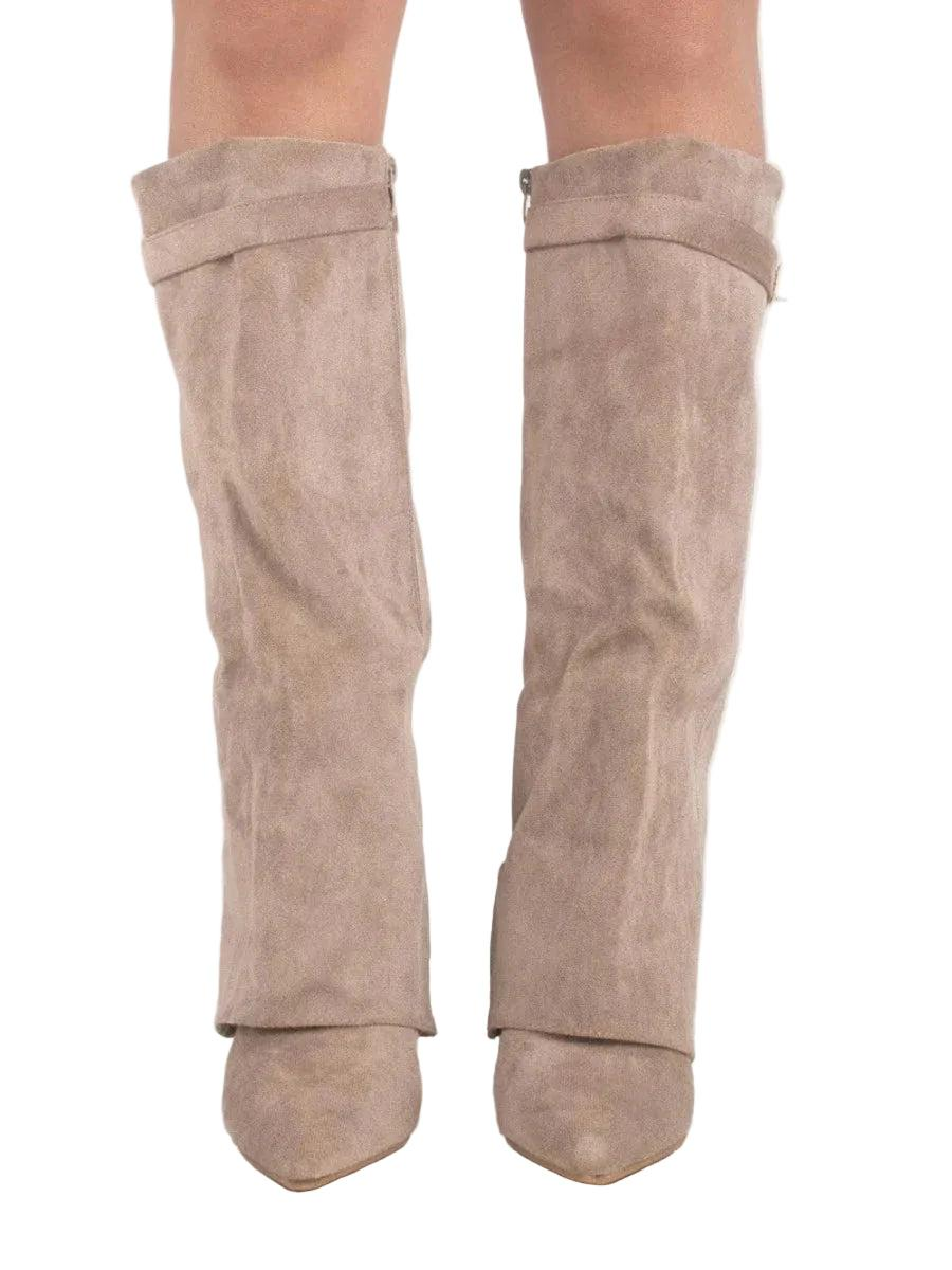 Front view of taupe knee-high boots showing the tall streamlined shafts, pointed toes, and subtle top trim.