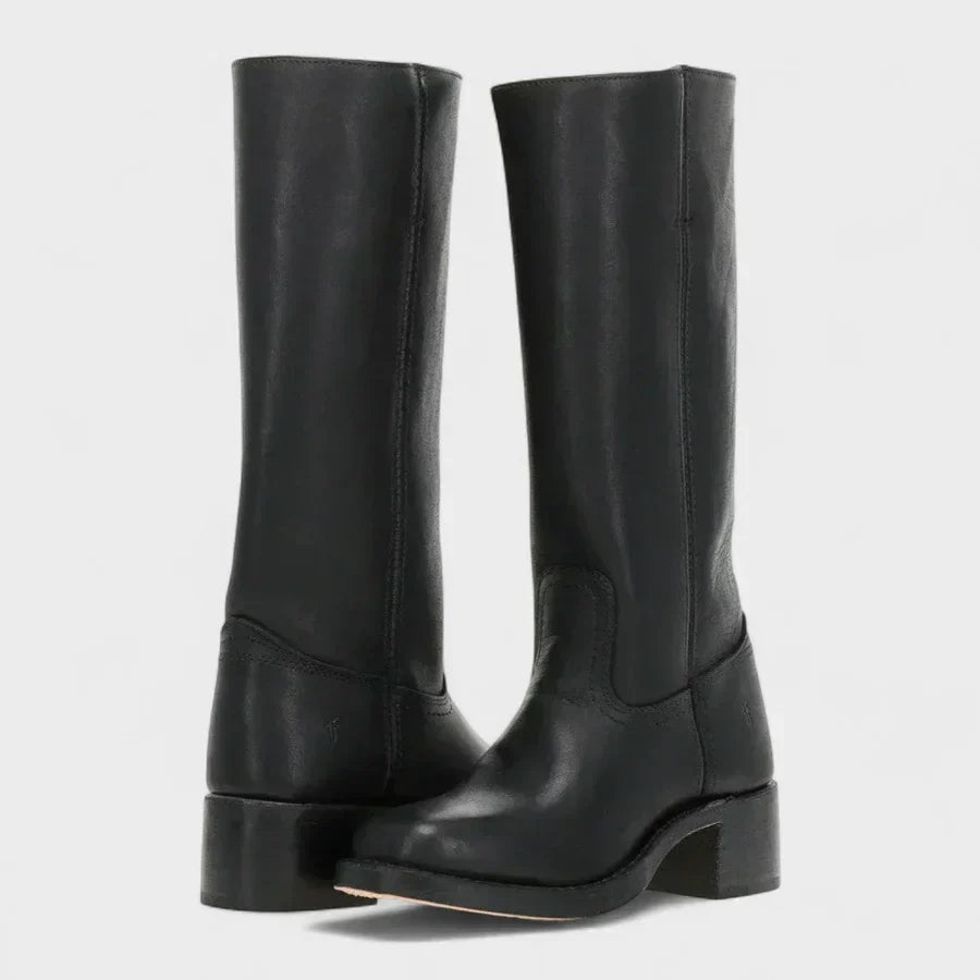 Black knee-high pull-on boots with rounded toes and sturdy block heels shown in a front three-quarter view.