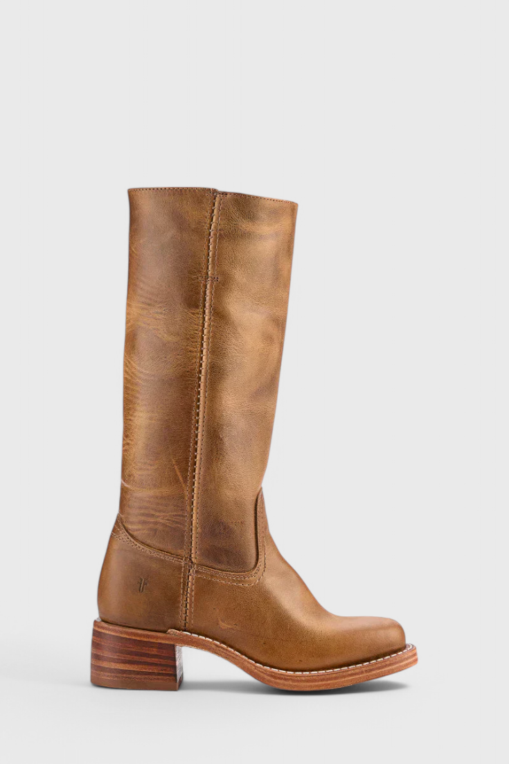 Warm brown knee-high boot in a compact side view, showing its softly textured appearance and striped low heel.