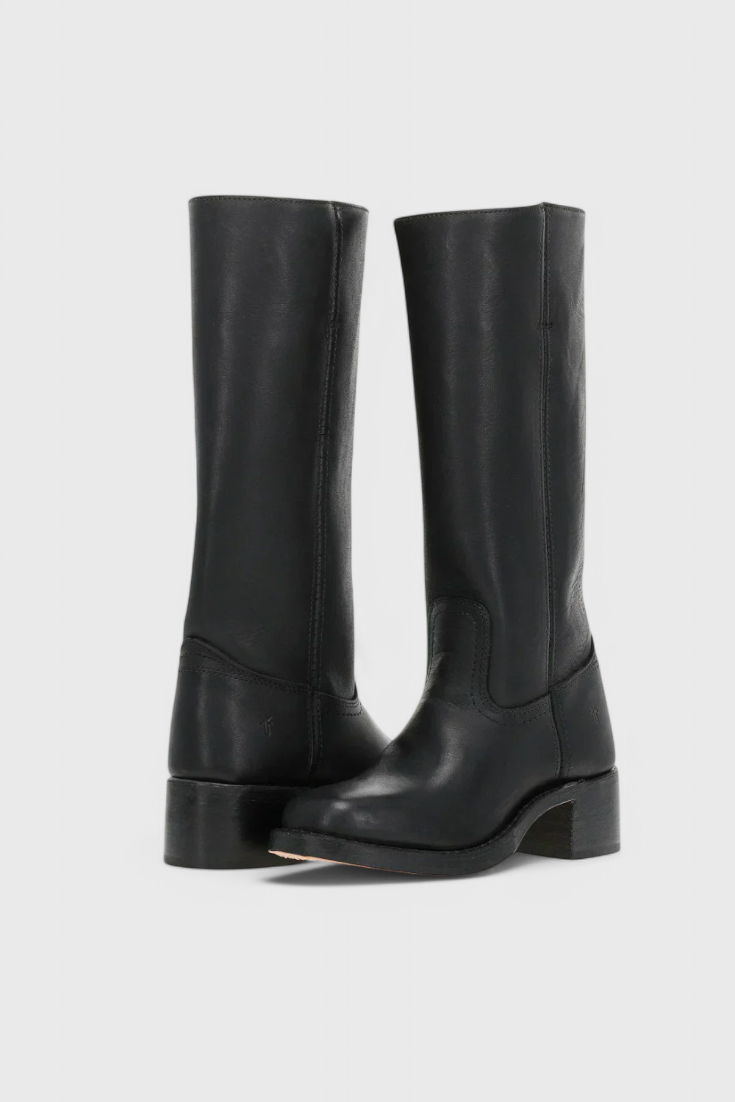 Pair of black knee-high boots in a three-quarter view with rounded toes, clean shafts, and low block heels.