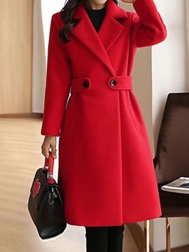 Front view of a red below-knee trench coat featuring wide lapels, a defined waist tab, long sleeves, and a gently flared lower silhouette.
