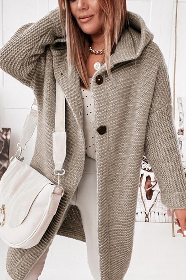 Taupe longline hooded cardigan worn open, highlighting the roomy fit and extended hem.