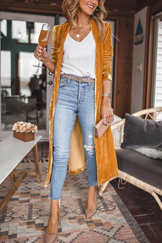 Mustard longline kimono coat with an open front and ruched sleeves, styled over a white top and jeans.